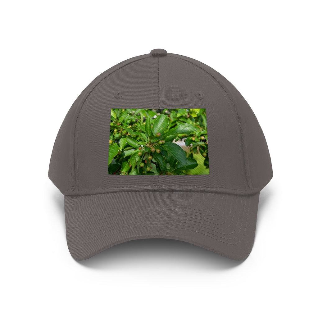 Seeds and Green Leaves Unisex Twill Hat showcasing a classic 6-panel design in durable cotton twill, featuring an adjustable Velcro closure.