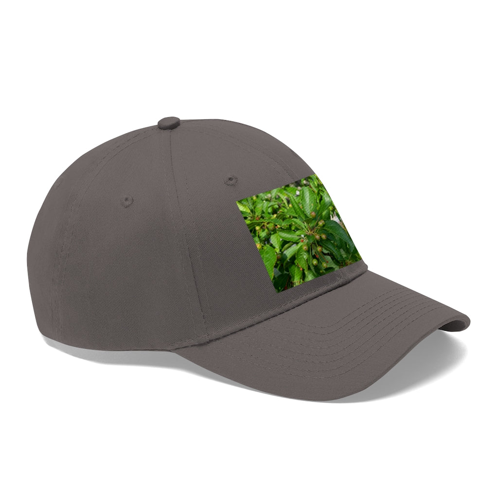 Seeds and Green Leaves Unisex Twill Hat showcasing a classic 6-panel design in durable cotton twill, featuring an adjustable Velcro closure.