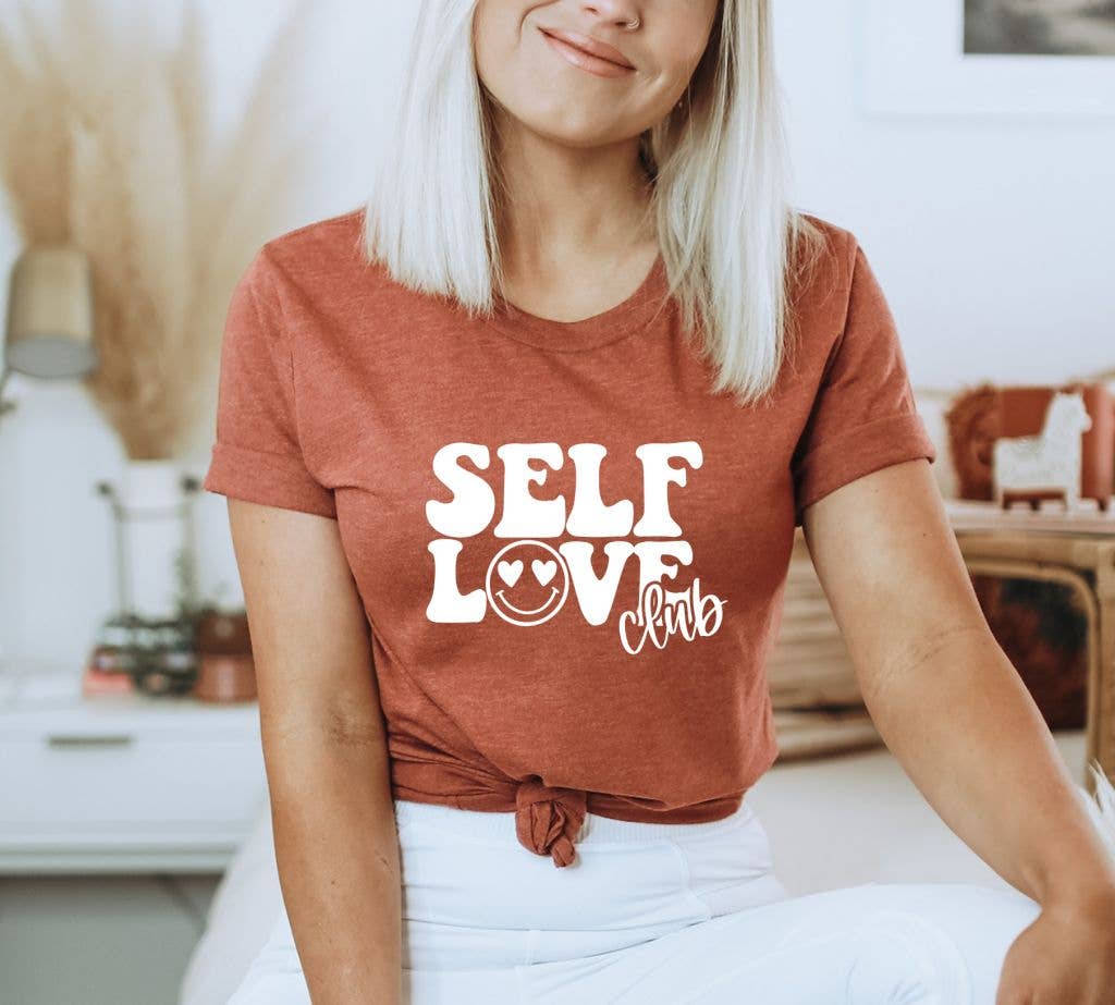 Self Love Club T-shirt made of premium ring spun cotton, featuring a soft flex print design, available in various sizes.