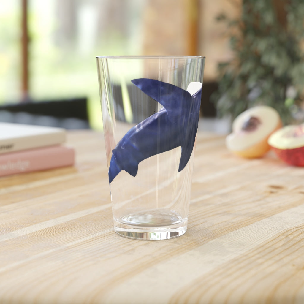 A clear 16oz Shark Pint Glass showcasing a custom printed design, ideal for beverages.