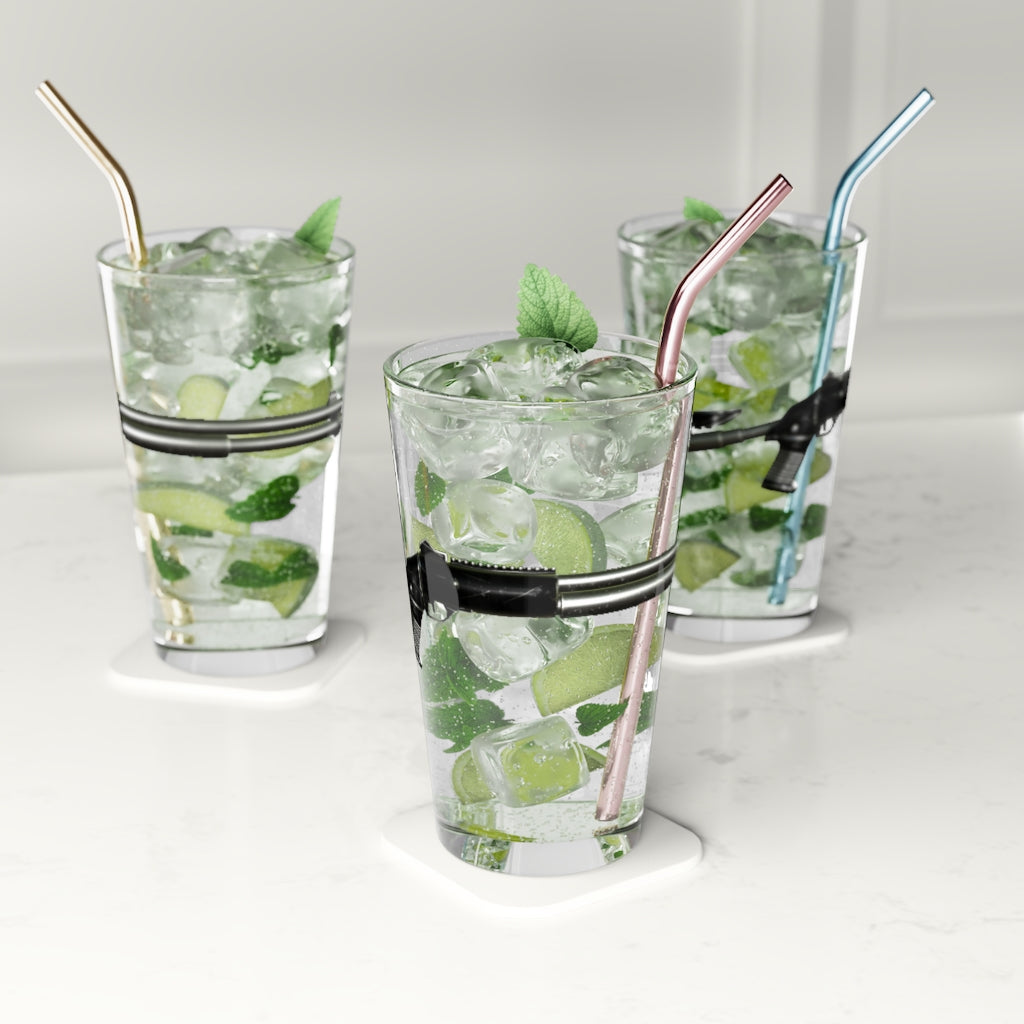 A clear 16oz Shotgun Pint Glass showcasing its elegant design, perfect for personalization and various beverages.