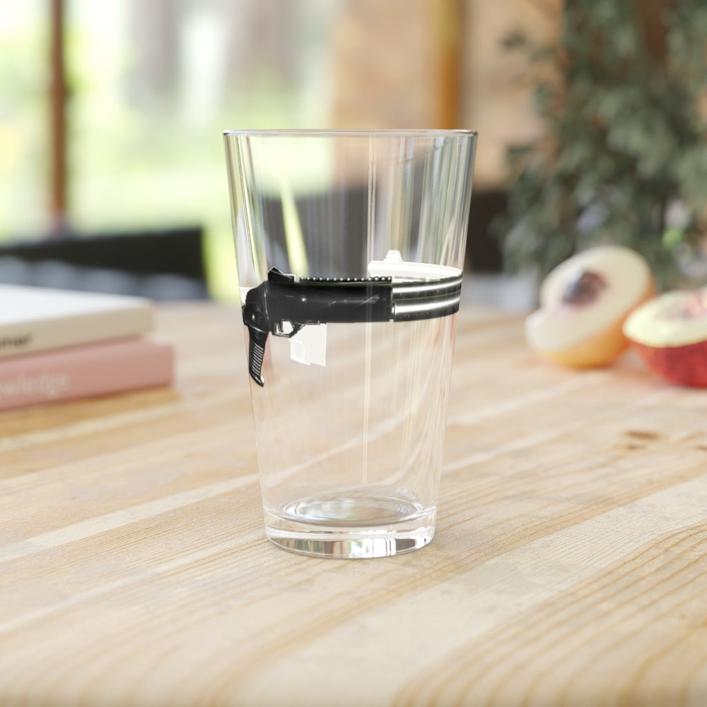 A clear 16oz Shotgun Pint Glass showcasing its elegant design, perfect for personalization and various beverages.