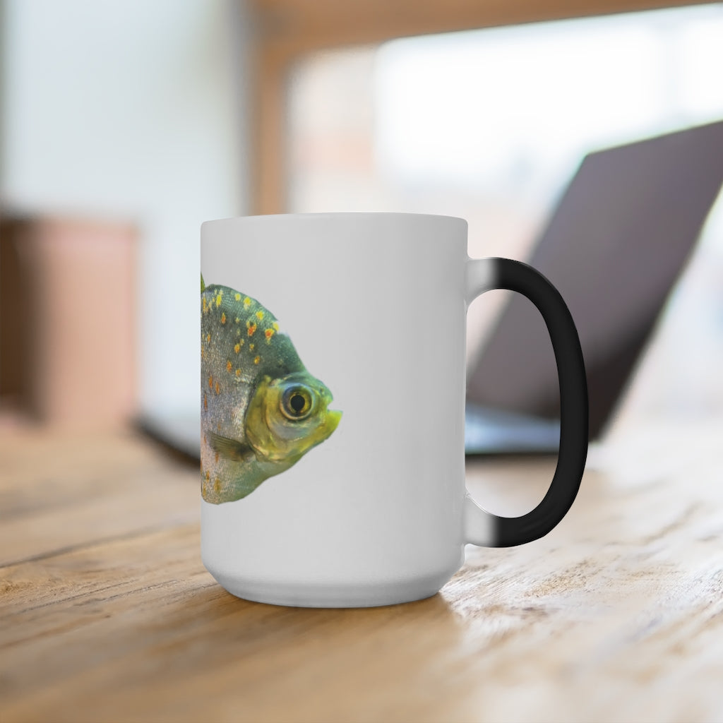 A stylish silver fish color changing mug showcasing its unique design and color transformation when filled with hot liquid.