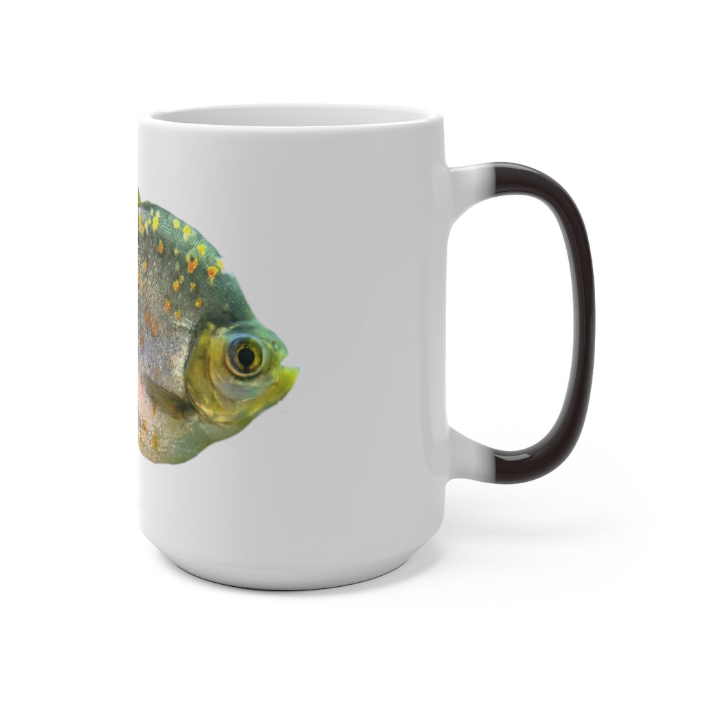 A stylish silver fish color changing mug showcasing its unique design and color transformation when filled with hot liquid.