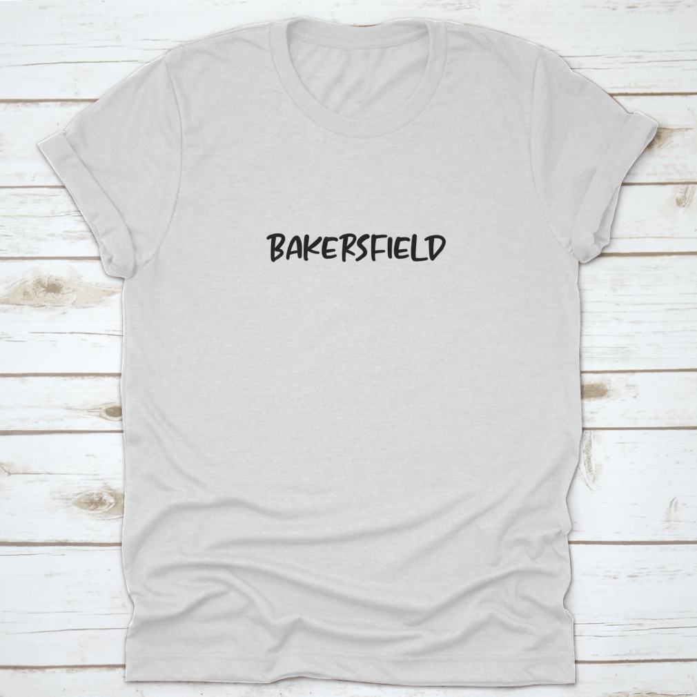A stylish t-shirt featuring handwritten typography text that reads 'Bakersfield', showcasing a comfortable fit and quality fabric.