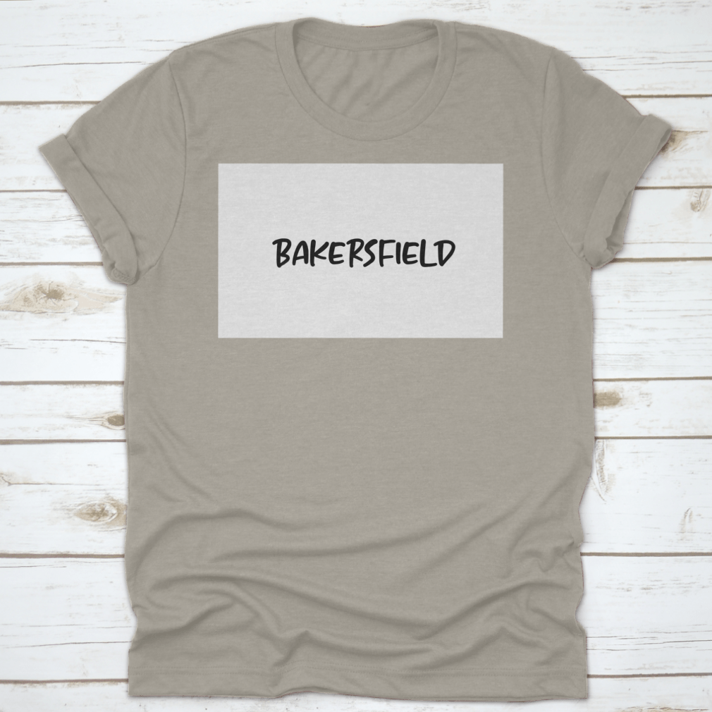 A stylish t-shirt featuring handwritten typography text that reads 'Bakersfield', showcasing a comfortable fit and quality fabric.