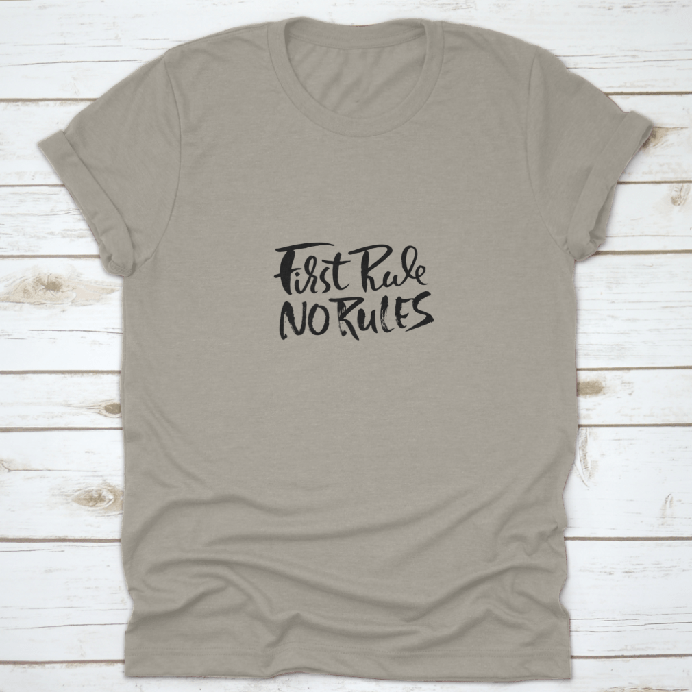 A comfortable 'First Rule, No Rule' t-shirt made of 100% cotton, featuring a classic fit and midweight fabric, perfect for everyday wear.