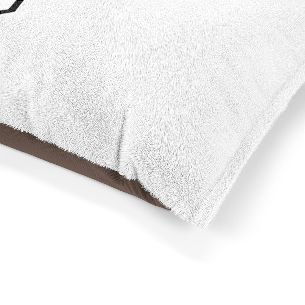 A cozy Skeleton Pet Bed featuring a soft fleece exterior and dark brown zippered back, perfect for indoor use.