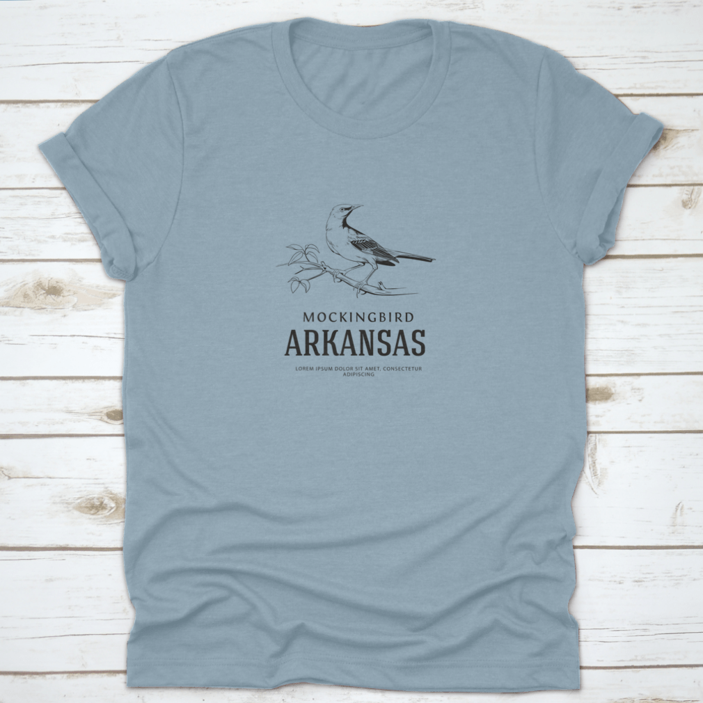 Vintage logo shirt featuring a sketch of a Nightingale Mockingbird, representing Arkansas state bird, made from soft cotton.