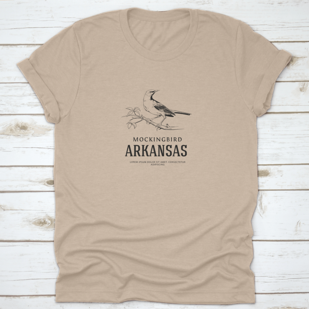 Vintage logo shirt featuring a sketch of a Nightingale Mockingbird, representing Arkansas state bird, made from soft cotton.
