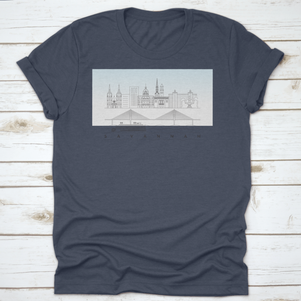 A stylish t-shirt featuring a sketch of Savannah, Georgia's skyline with a food stand and sandy beach, showcasing vibrant colors and artistic details.