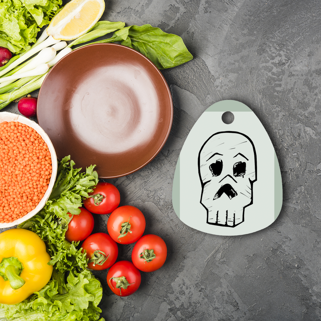 Skull and Cross Bones Sublimation Glass Cutting Board with custom design options, featuring a durable glass surface and rubber feet.