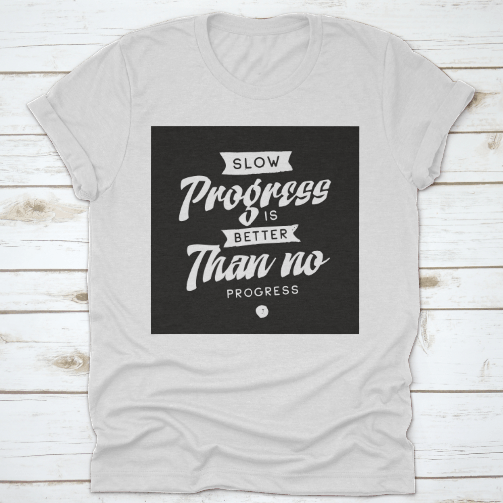 A comfortable cotton t-shirt featuring the inspirational quote 'Slow Progress is Better Than No Progress' in a stylish design.