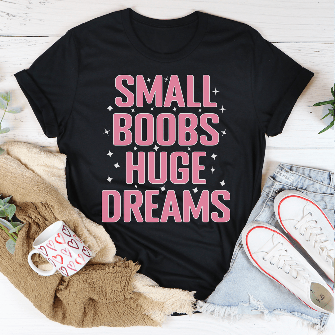 A stylish Small Boobs Huge Dreams T-Shirt made from soft cotton, featuring a humorous slogan and durable stitching.