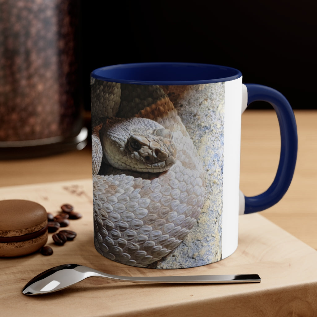A stylish 11oz Snake Accent Coffee Mug with a white exterior and colorful interior, featuring a comfortable C-handle.