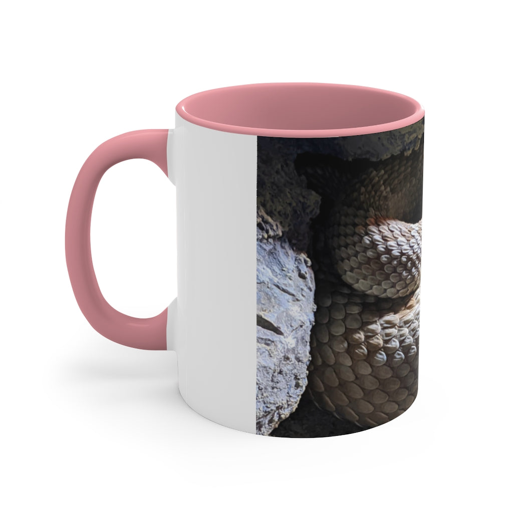 A stylish 11oz Snake Accent Coffee Mug with a white exterior and colorful interior, featuring a comfortable C-handle.