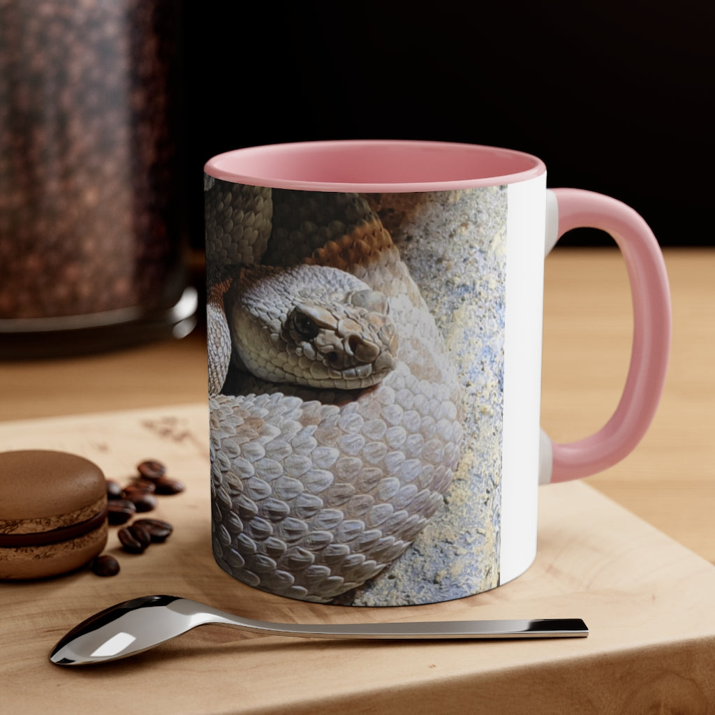 A stylish 11oz Snake Accent Coffee Mug with a white exterior and colorful interior, featuring a comfortable C-handle.