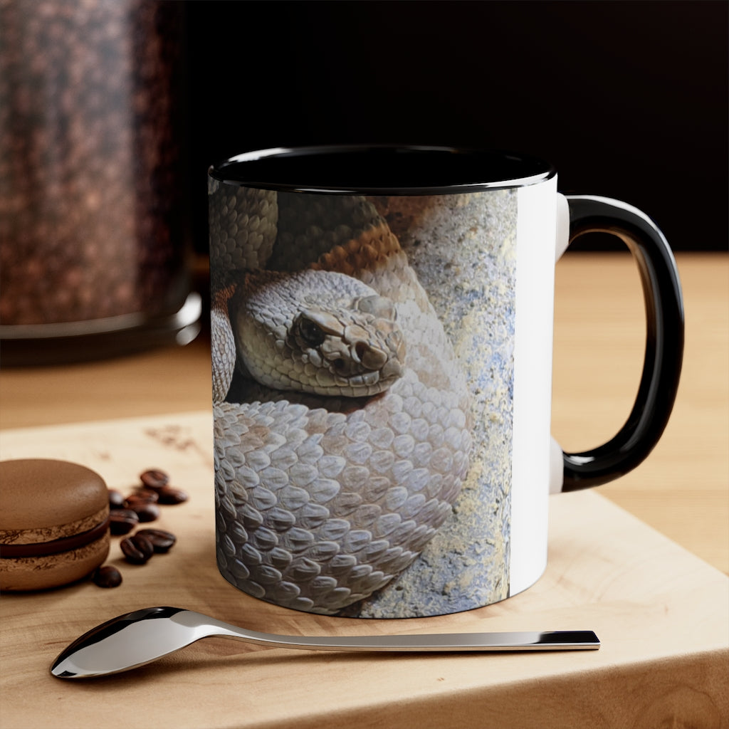 A stylish 11oz Snake Accent Coffee Mug with a white exterior and colorful interior, featuring a comfortable C-handle.
