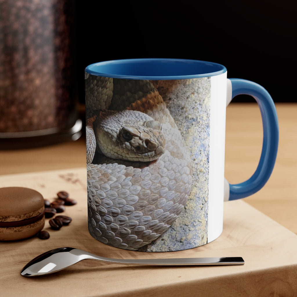 A stylish 11oz Snake Accent Coffee Mug with a white exterior and colorful interior, featuring a comfortable C-handle.