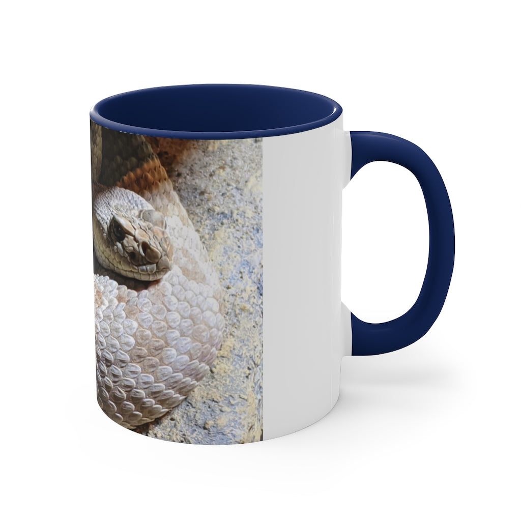 A stylish 11oz Snake Accent Coffee Mug with a white exterior and colorful interior, featuring a comfortable C-handle.