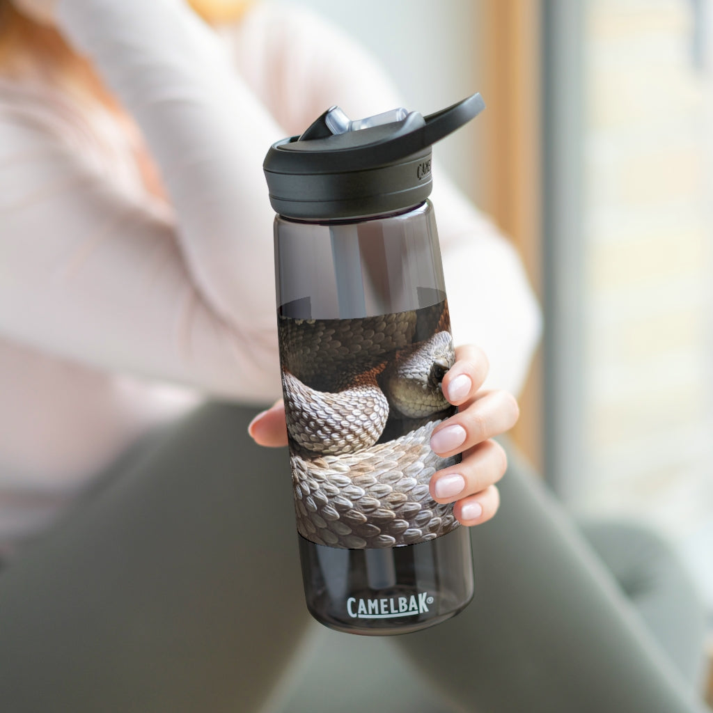 Snake CamelBak Eddy® Water Bottle in 20oz and 25oz sizes, showcasing its durable Tritan™ material and spill-proof design.