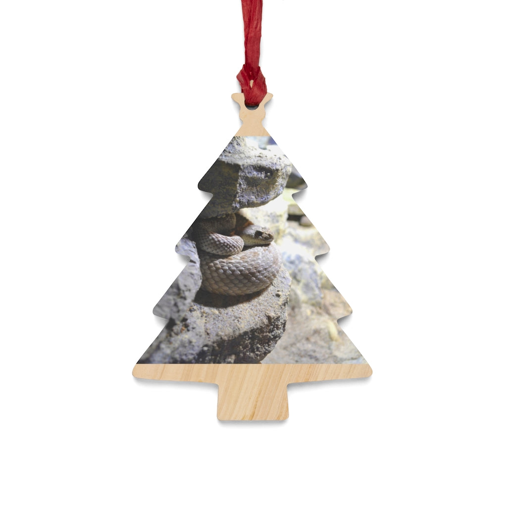 A collection of Snake Wooden Christmas Ornaments in various whimsical shapes, featuring a rustic wooden finish and red ribbons for hanging.
