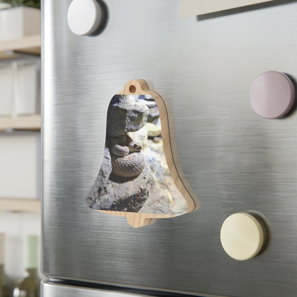 A collection of Snake Wooden Christmas Ornaments in various whimsical shapes, featuring a rustic wooden finish and red ribbons for hanging.