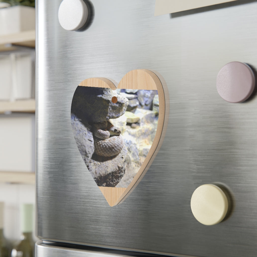 A collection of Snake Wooden Christmas Ornaments in various whimsical shapes, featuring a rustic wooden finish and red ribbons for hanging.