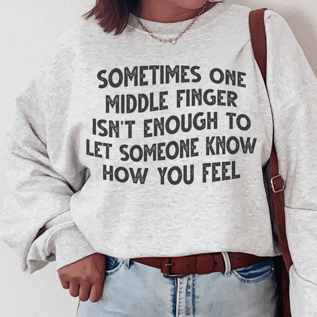A cozy hoodie featuring a unique design with the phrase 'Sometimes One Middle Finger Is Not Enough', made from a soft cotton/poly fleece blend.