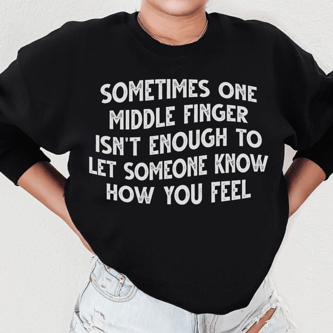 A cozy hoodie featuring a unique design with the phrase 'Sometimes One Middle Finger Is Not Enough', made from a soft cotton/poly fleece blend.
