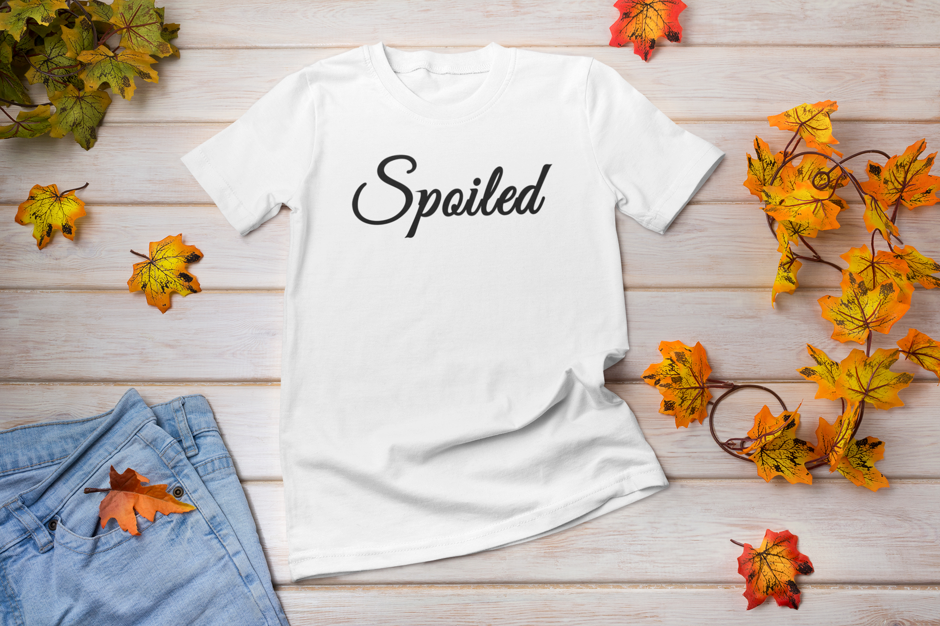 Spoiled Lettering T-shirt featuring a modern retail fit and stylish lettering design, suitable for unisex wear.