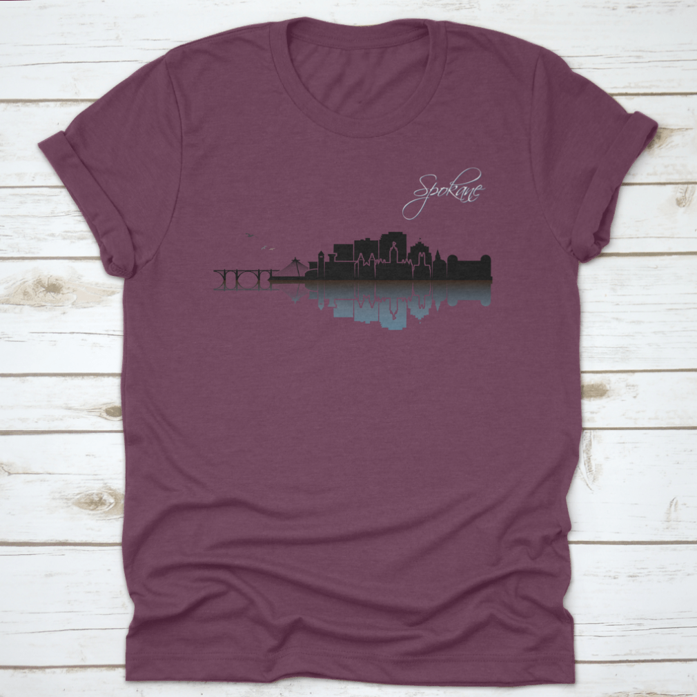 Hand-drawn vector design of Spokane skyline on a comfortable cotton t-shirt, showcasing iconic buildings and scenery.