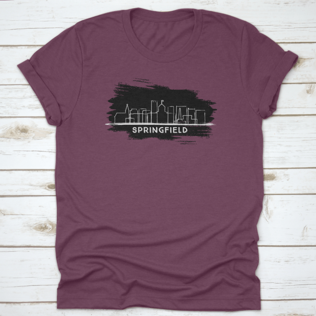 Hand-drawn sketch of the Springfield Illinois city skyline silhouette on a cotton fabric background.