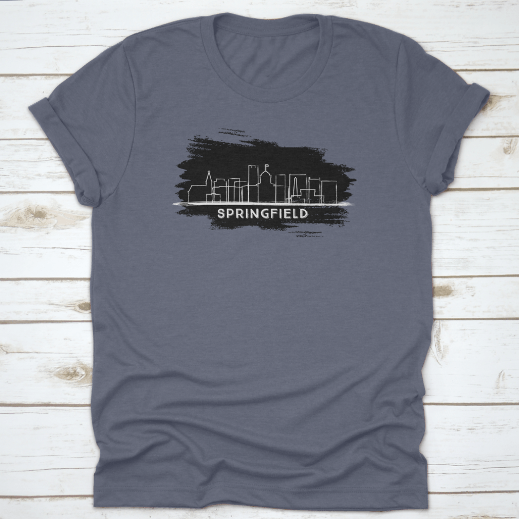 Hand-drawn sketch of the Springfield Illinois city skyline silhouette on a cotton fabric background.