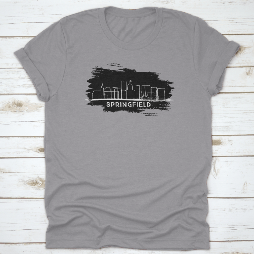 Hand-drawn sketch of the Springfield Illinois city skyline silhouette on a cotton fabric background.