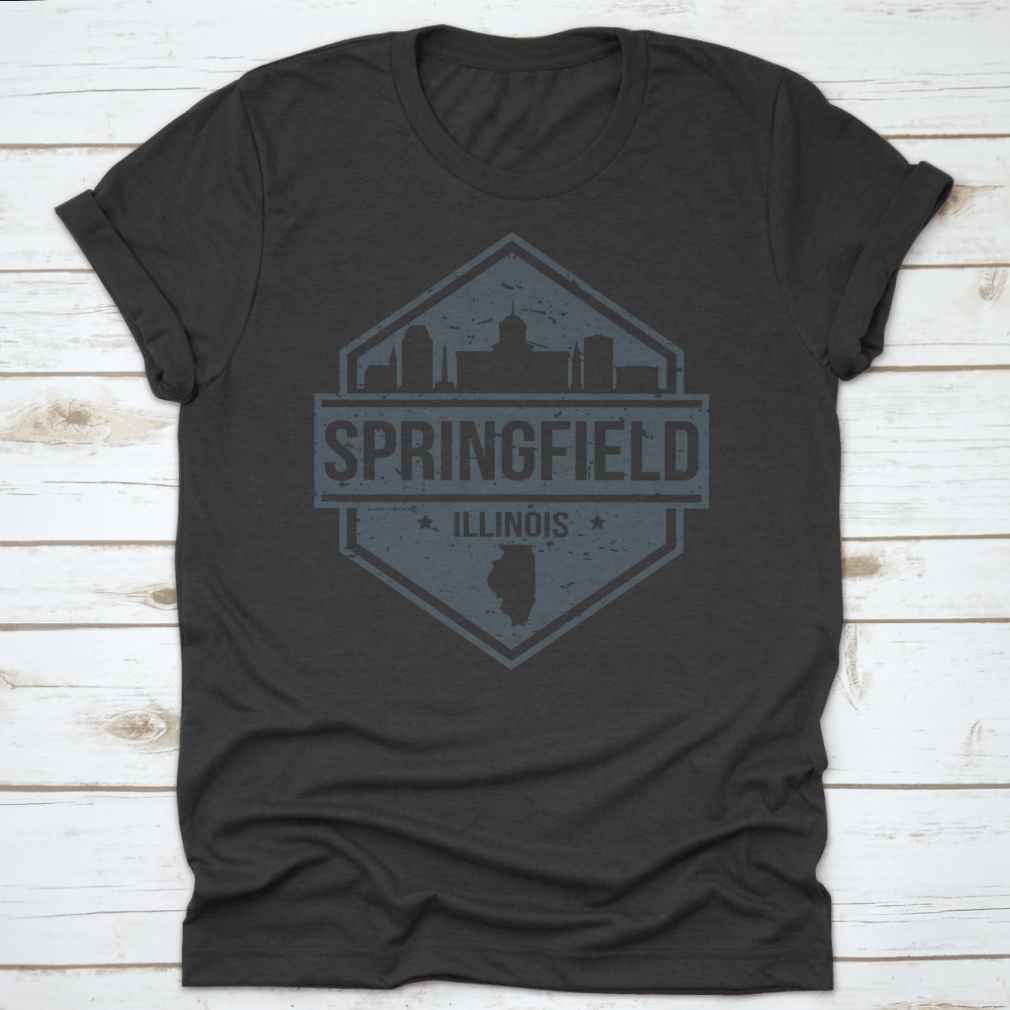 A stylish t-shirt featuring the Springfield Illinois skyline design, showcasing iconic landmarks in a travel stamp style.