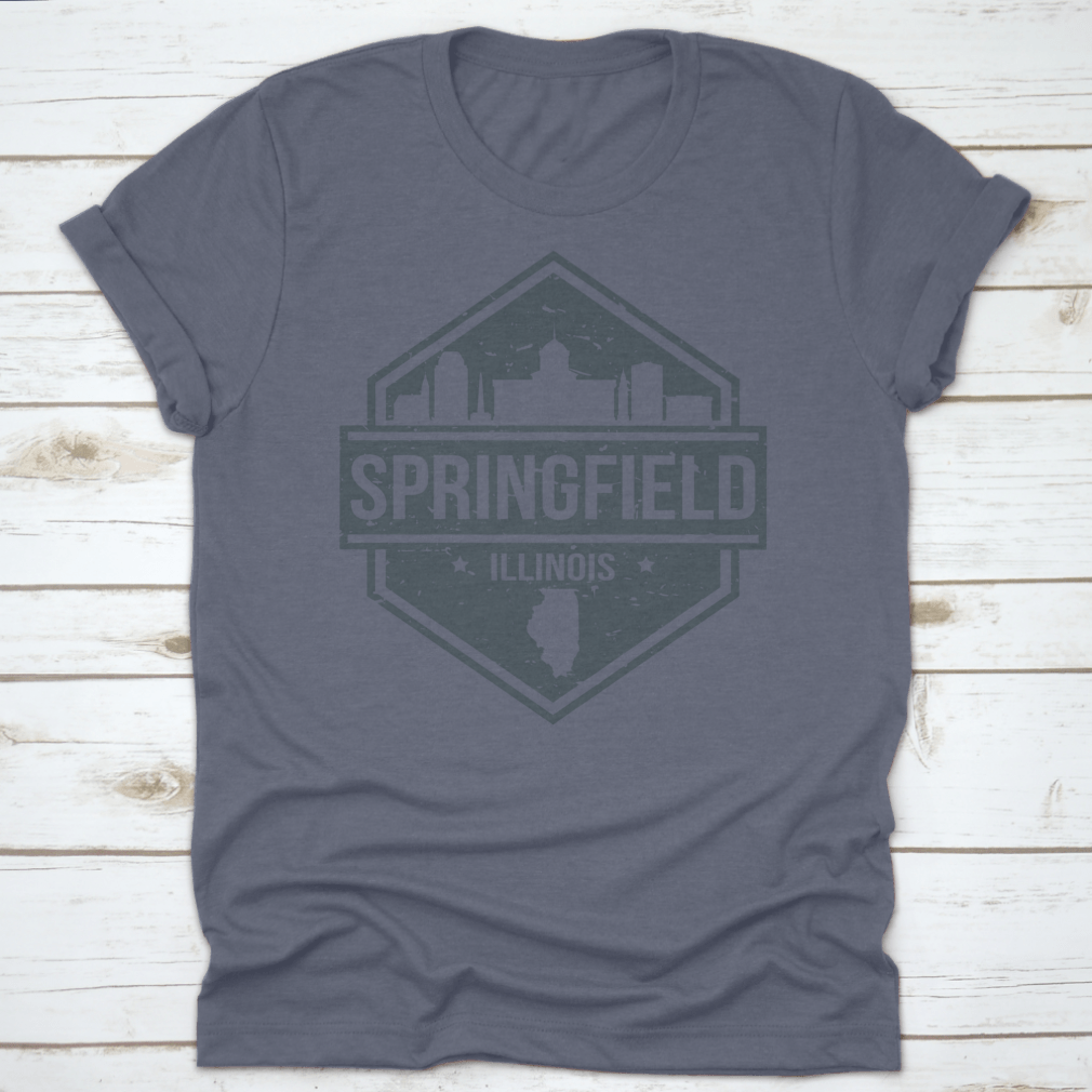 A stylish t-shirt featuring the Springfield Illinois skyline design, showcasing iconic landmarks in a travel stamp style.