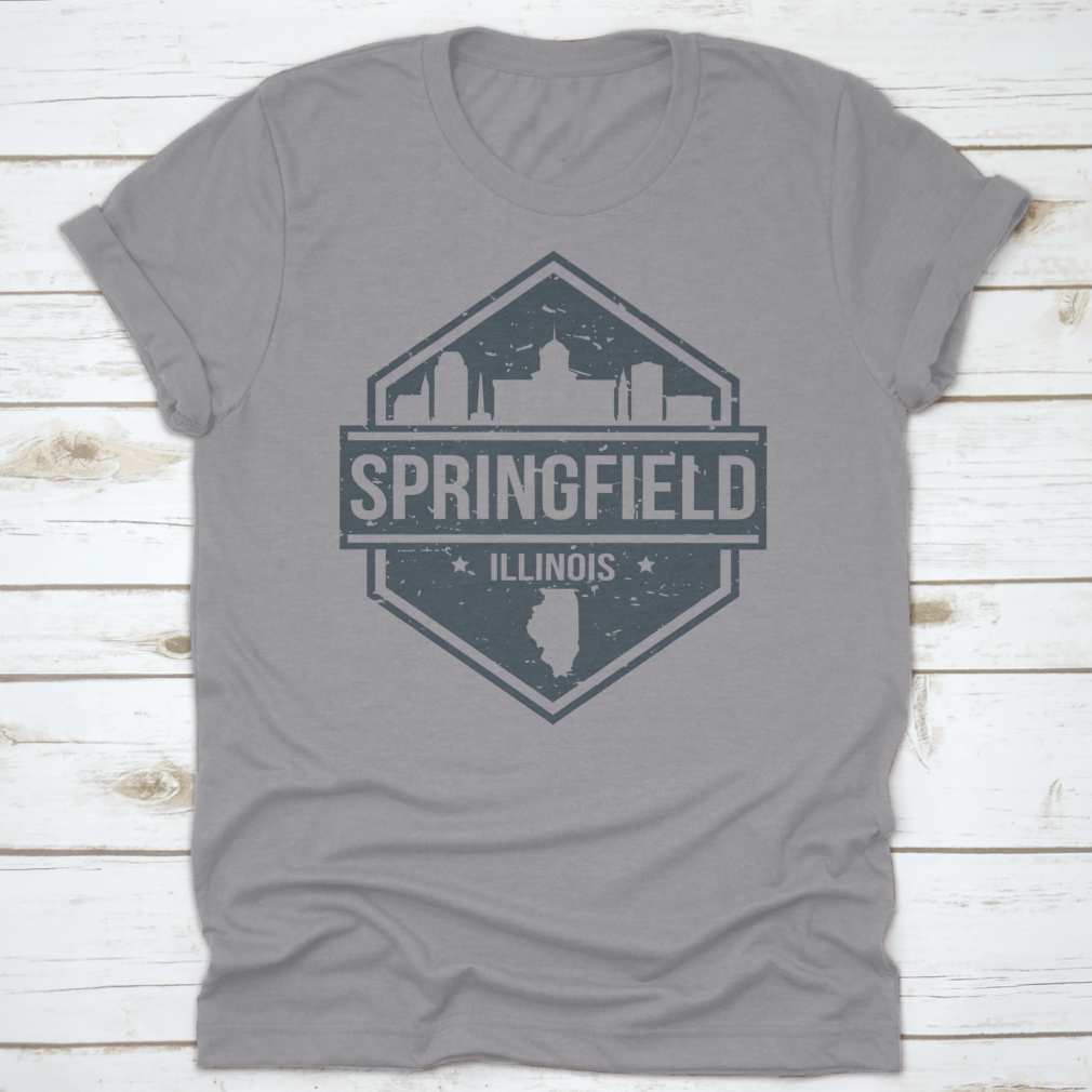 A stylish t-shirt featuring the Springfield Illinois skyline design, showcasing iconic landmarks in a travel stamp style.