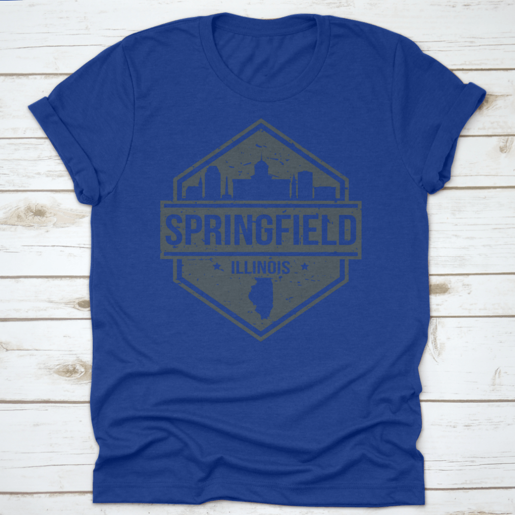 A stylish t-shirt featuring the Springfield Illinois skyline design, showcasing iconic landmarks in a travel stamp style.