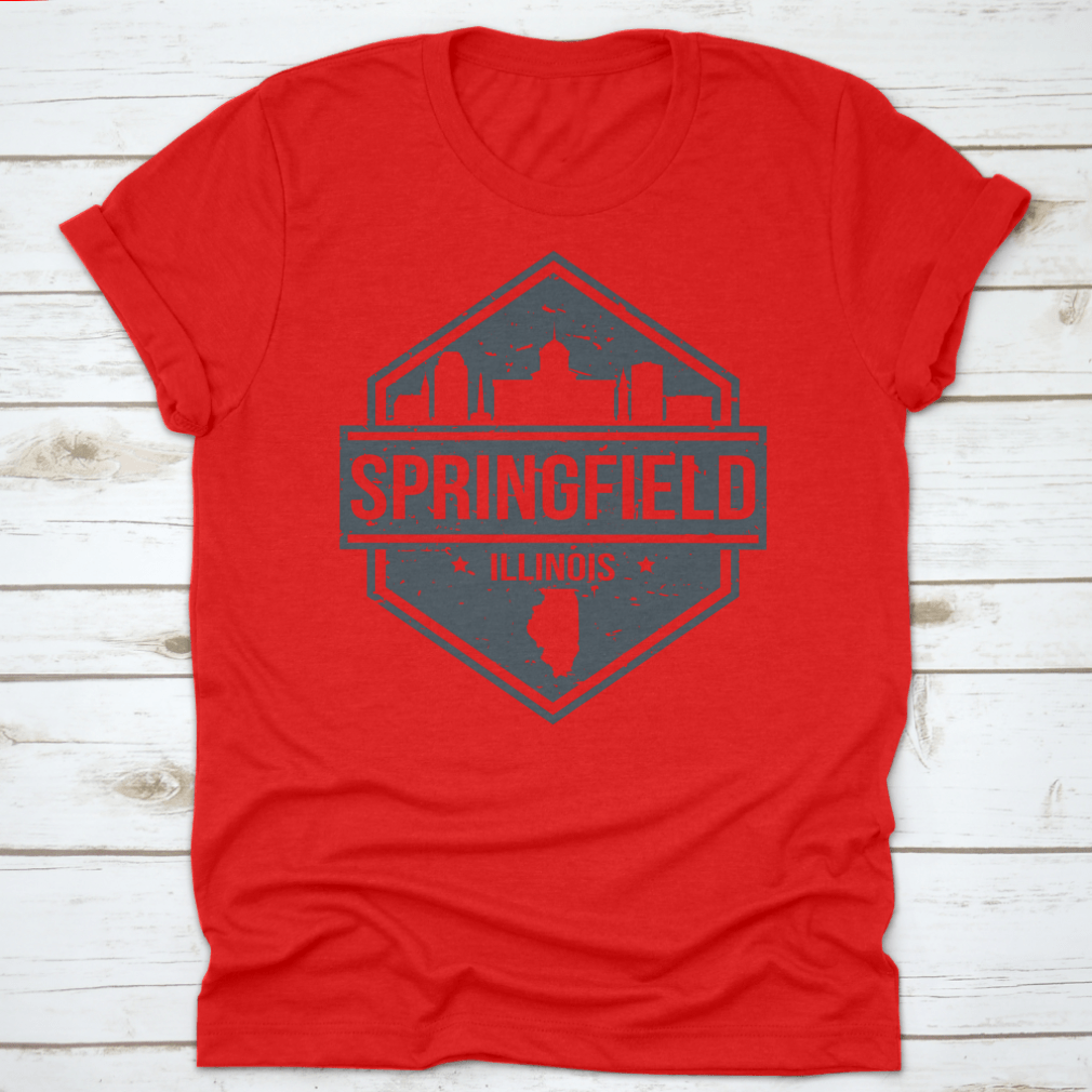 A stylish t-shirt featuring the Springfield Illinois skyline design, showcasing iconic landmarks in a travel stamp style.