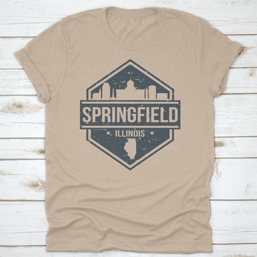 A stylish t-shirt featuring the Springfield Illinois skyline design, showcasing iconic landmarks in a travel stamp style.