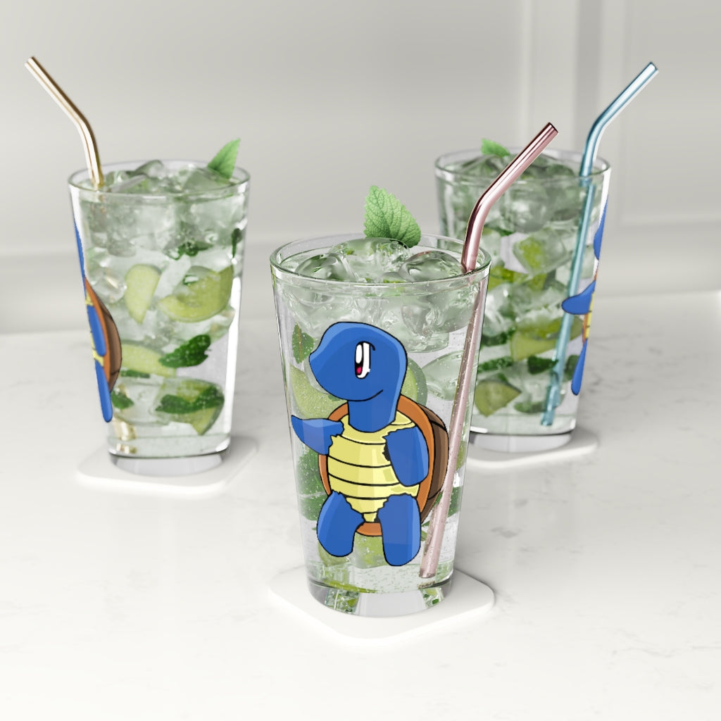 A clear 16oz Squata Pint Glass with customizable design options, perfect for beverages.