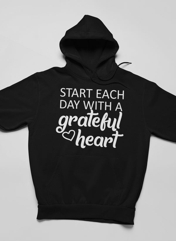 Cozy hoodie featuring the phrase 'Start Each Day With A Grateful Heart', made from cotton/poly fleece blend, showcasing adjustable hood and banded cuffs.