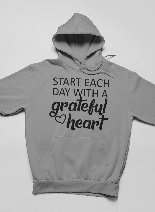 Cozy hoodie featuring the phrase 'Start Each Day With A Grateful Heart', made from cotton/poly fleece blend, showcasing adjustable hood and banded cuffs.