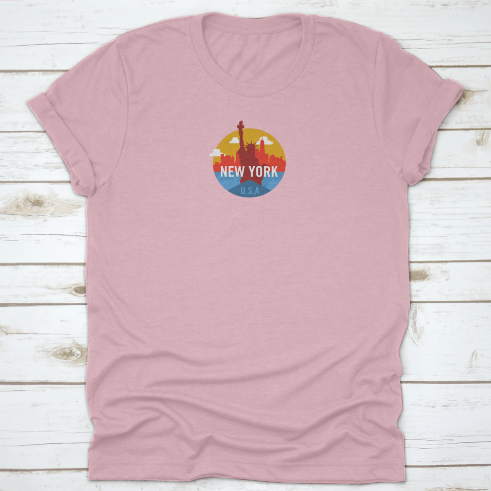 Statue of Liberty t-shirt displayed against a New York City skyline background, showcasing its classic fit and soft fabric.