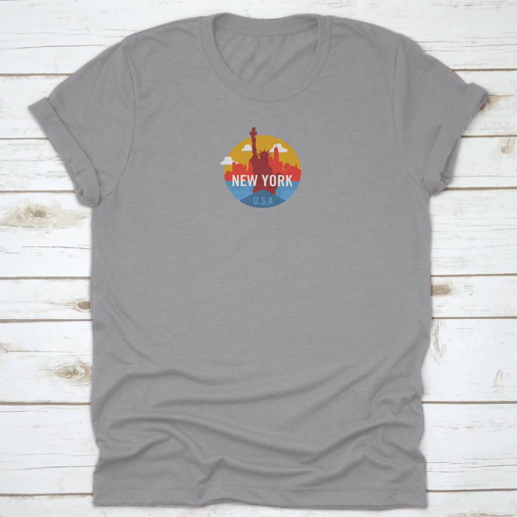 Statue of Liberty t-shirt displayed against a New York City skyline background, showcasing its classic fit and soft fabric.