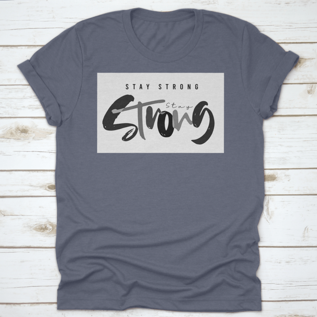Stay Strong Typography Design T-Shirt in various colors, showcasing its comfortable fabric and classic fit.