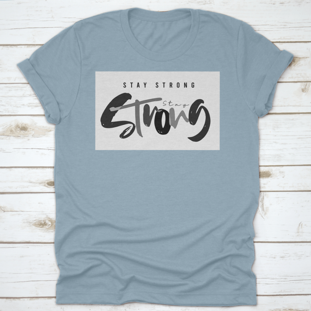 Stay Strong Typography Design T-Shirt in various colors, showcasing its comfortable fabric and classic fit.