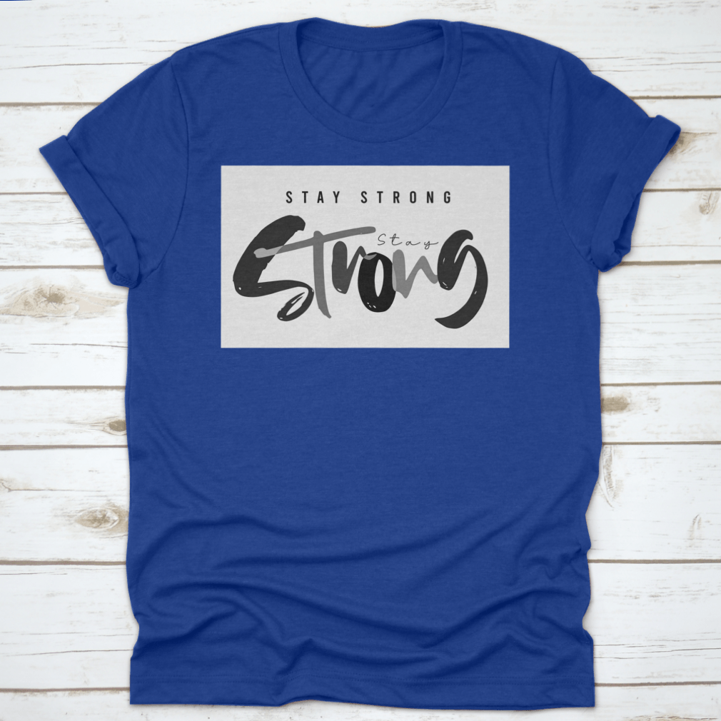 Stay Strong Typography Design T-Shirt in various colors, showcasing its comfortable fabric and classic fit.