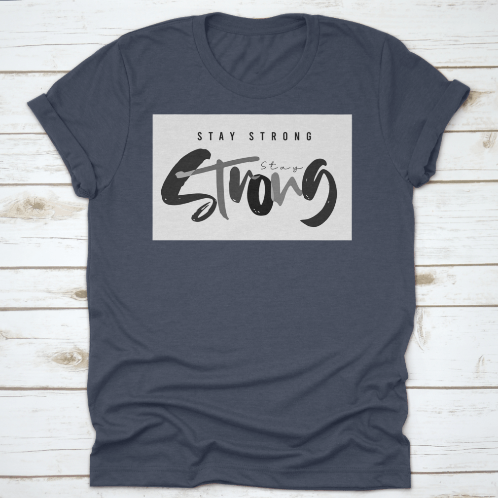 Stay Strong Typography Design T-Shirt in various colors, showcasing its comfortable fabric and classic fit.